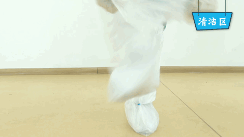 The process of wearing disposable protective clothing
